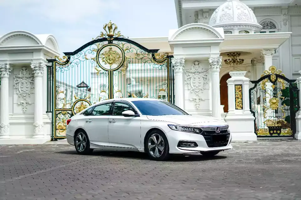 White Honda Accord 2021 at a villa gate