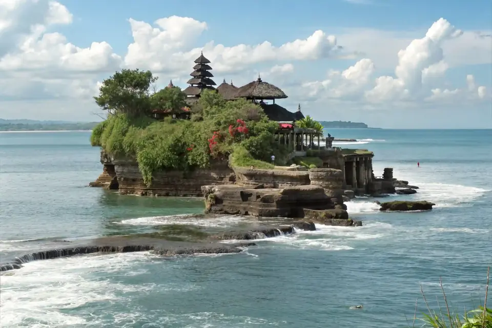 Tanah Lot temple on its rock in the sea